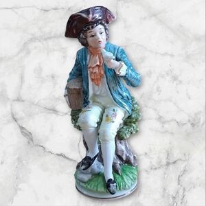 Vintage Porcelain Man and Bird Figure
